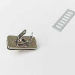 Замок вертушка на винтах 34*16 Серебро