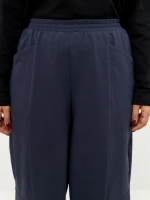 Брюки бананы трикотажные с декоративными швами