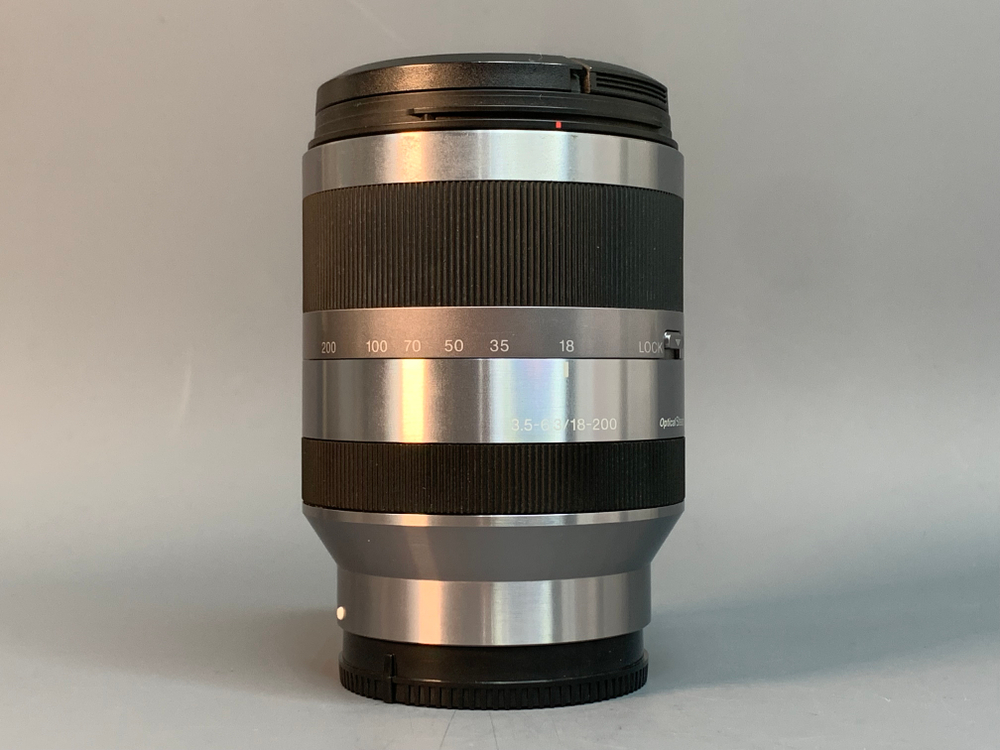 Sony E 18-200mm 3.5-6.3 OSS точки внутри передней линзе