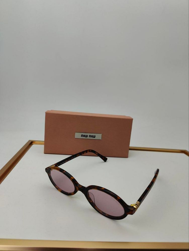 Солнцезащитные очки MIU MIU