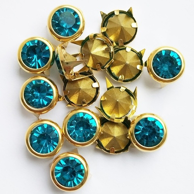 Клёпки 15шт. золотистые 10мм с бирзовыми кристаллами с цапами.