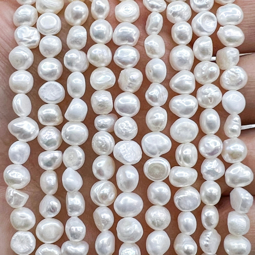 Жемчуг 2А речной бусины 6 мм, на нитке 38 см