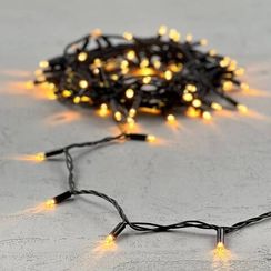 Светодиодная гирлянда с колпачком 100 экстра теплых белых LED ламп 10 м., 24В., черный провод ПВХ, IP65, LTC (PST100CAP-11-1EWW)