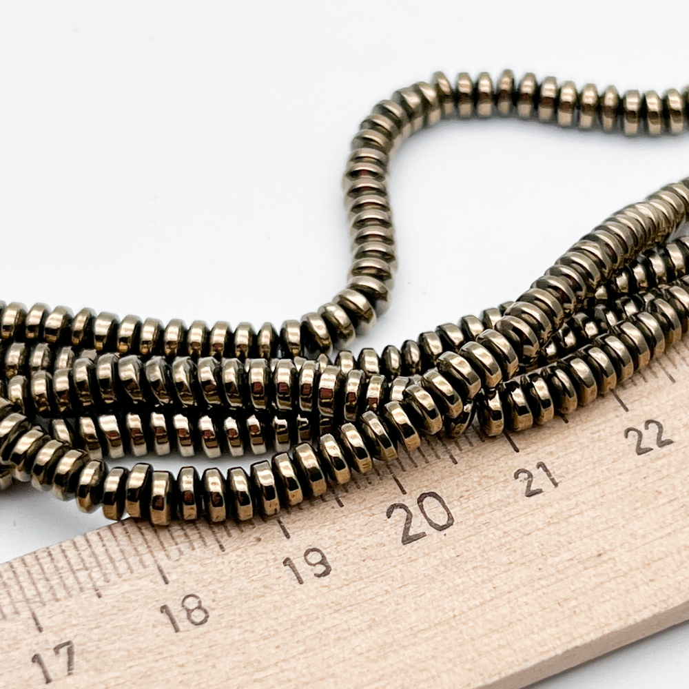 Гематит Рондель бусины (имитация), цвет золотисто-бронзовый, размер около 2*4 мм, цена за отрезок 19 см (1/2 нити)