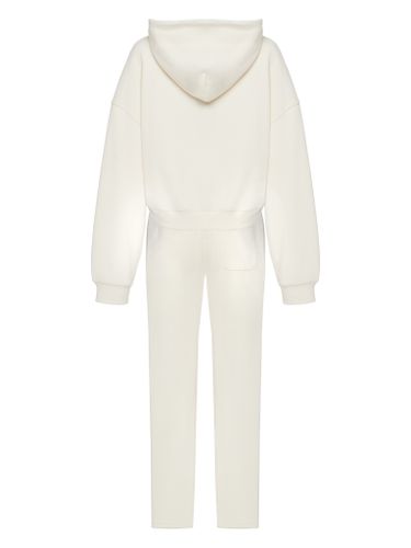 Молочный спортивный костюм The Puh