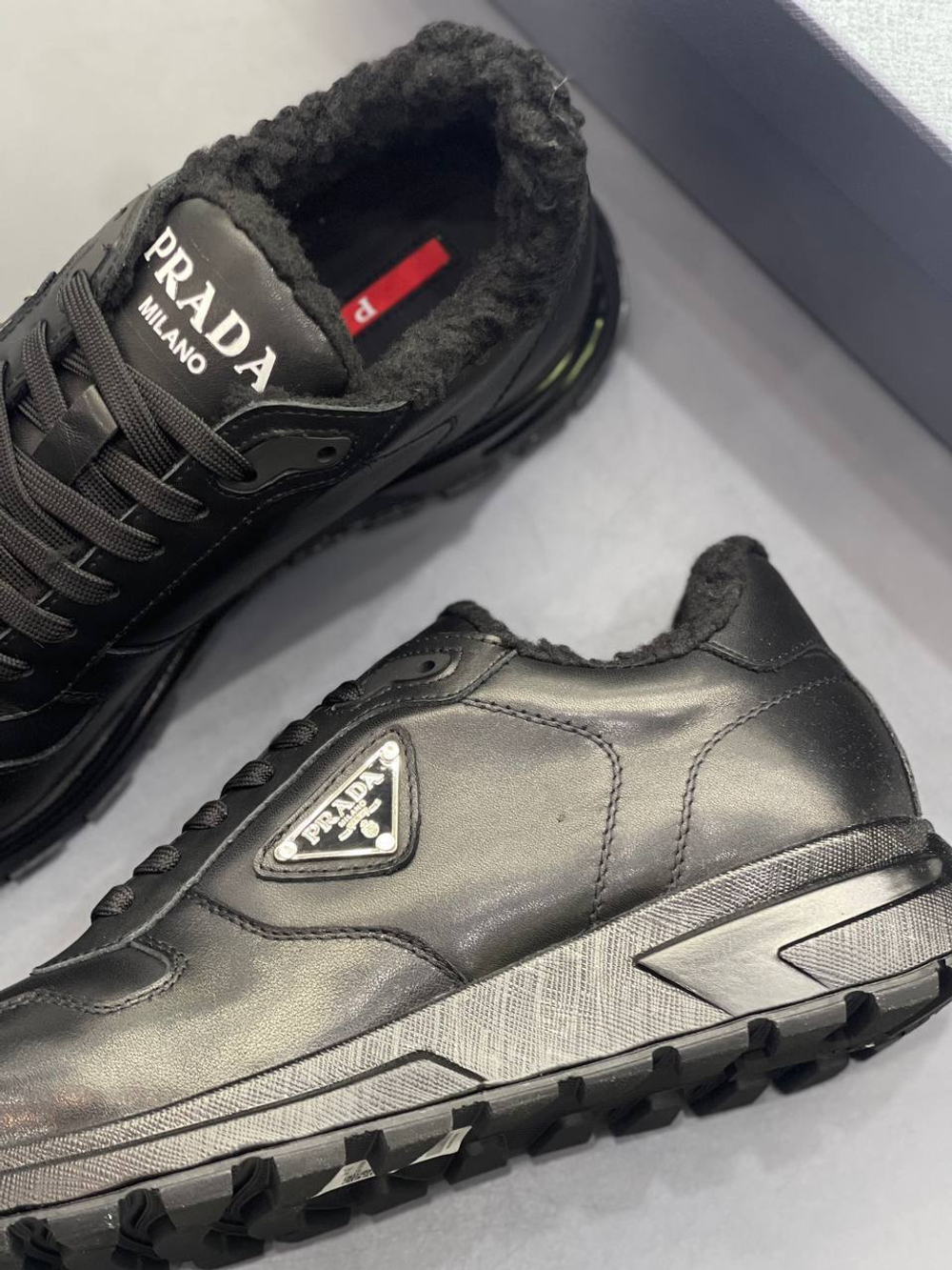 Кроссовки Prada