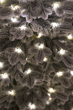 Ель искусственная заснеженная с лампочками Тикко