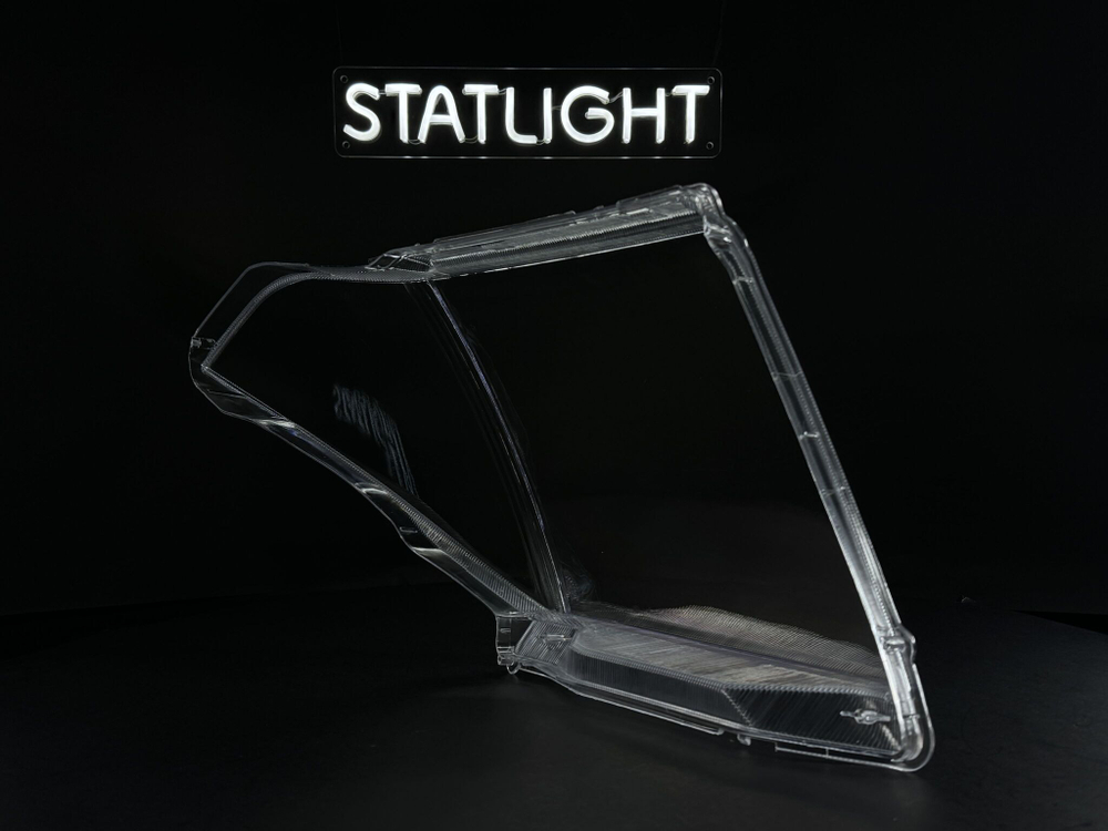 Левое стекло фары Nissan Navara Pathfinder R51 2004-2010