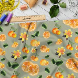 Ткань кулирная гладь апельсины на зелёном фоне