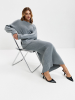 Серая вязаная юбка с пайетками