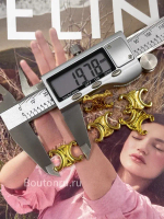 Декоративный пришивной элемент Сел. золотой в форме лого