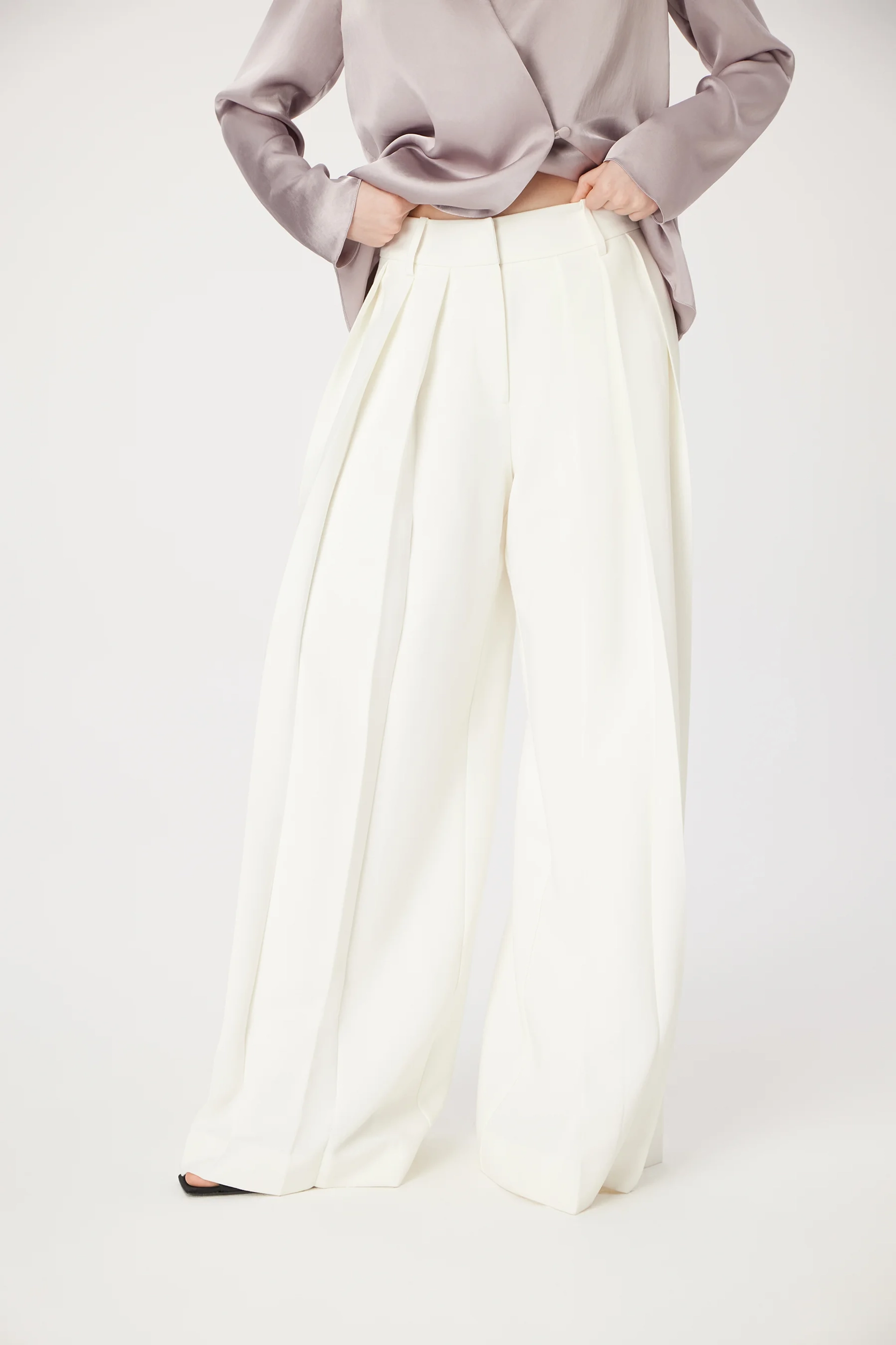 Брюки со складками