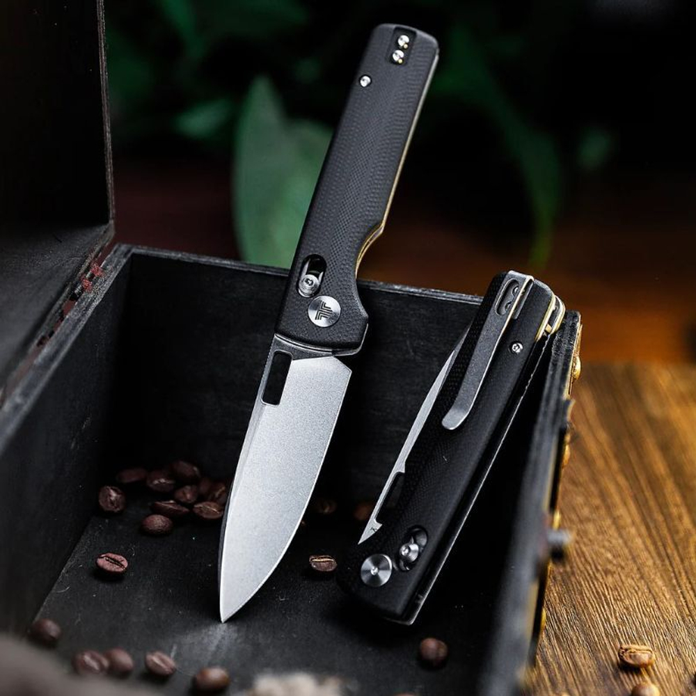 Складной туристический нож TRIVISA Sabretooth-BG клинок 14C28N рукоять G10 (черный-зеленый)