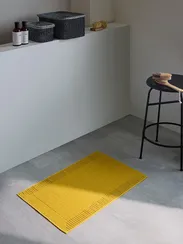 Коврик для ванной с фактурным бортиком цвета охры из коллекции essential, 50х80 см