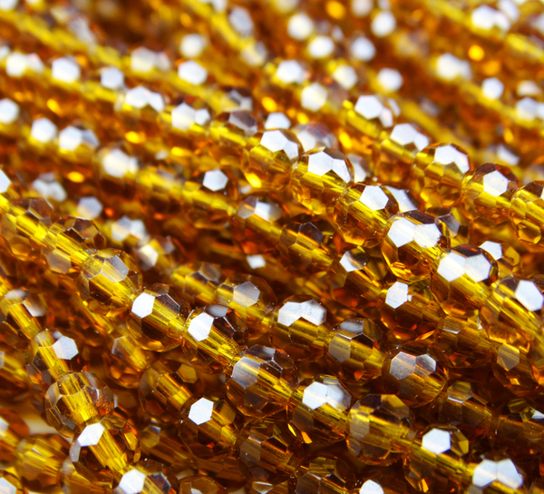 БШ030НН4 Хрустальные бусины "32 грани", цвет: коричневый прозрачный, размер 4 мм, кол-во: 95-100 шт.