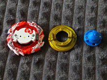 Волчок Astral Hello Kitty Over Revolve'-0 B00 от Takara Tomy