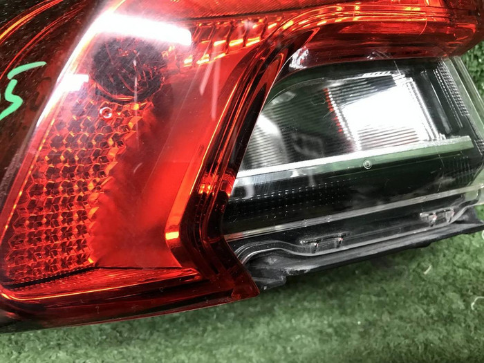 Фонарь левый внешний Toyota Corolla Е210 (18-нв)