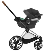 Коляска 3 в 1 Cybex Priam IV Chrome Brown complete и автокресло Aton B2 i-Size Volcano Black Cozy Beige