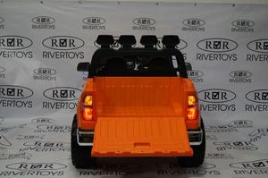 Детский электромобиль River Toys Toyota Tundra Mini 12v оранжевый