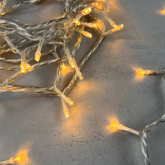 Светодиодная нить 100 экстра теплых белых LED ламп, 10 м., 24В., прозрачный провод ПВХ, LTC (PST100-10-1EWW)