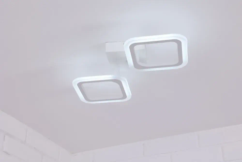 Люстра потолочная светодиодная Estero 39205-2sm, цвет белый. Люстра с пультом управления, освещение до 9 кв.м, мощность 32 Вт. Светильник потолочный