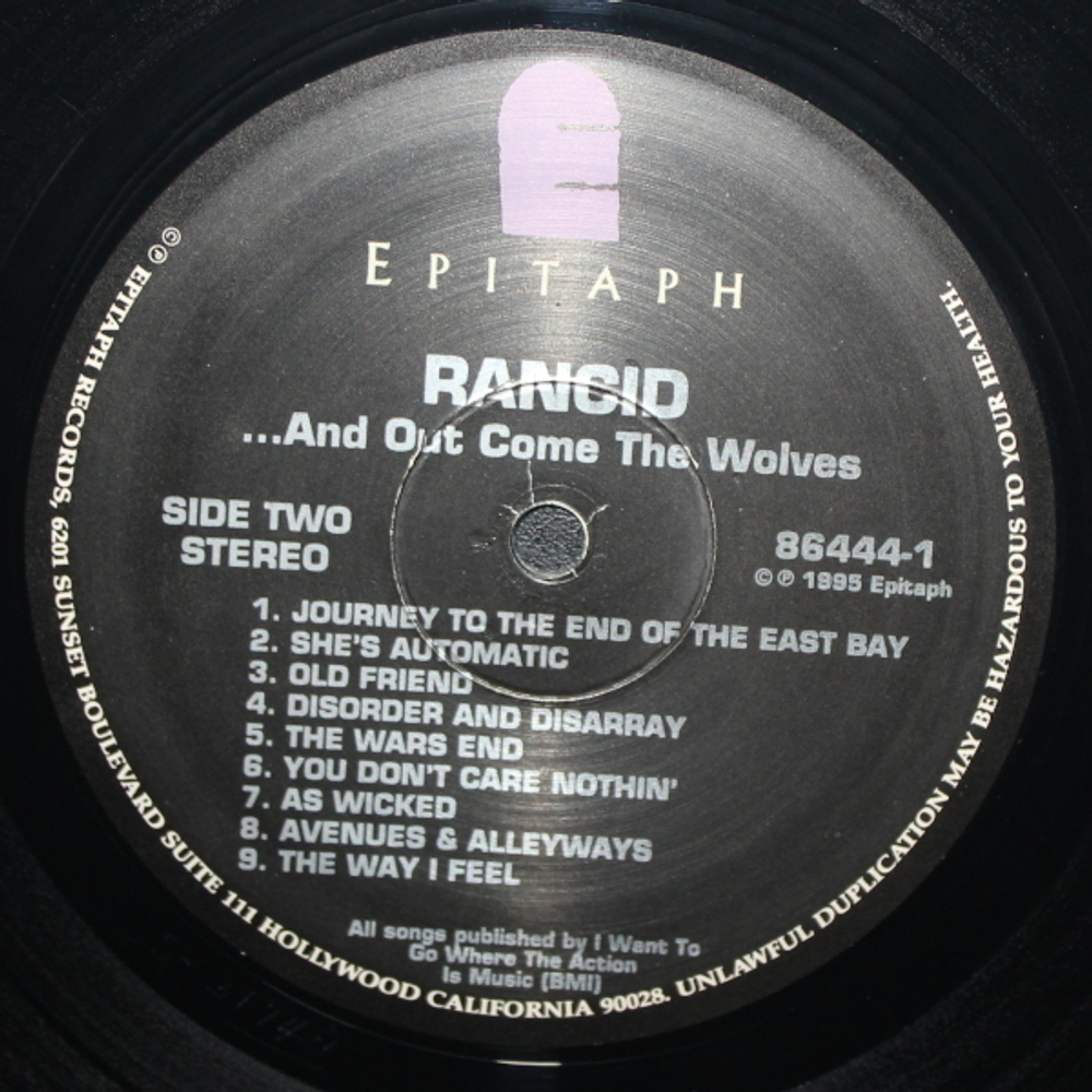 Rancid / ...And Out Come The Wolves (LP)