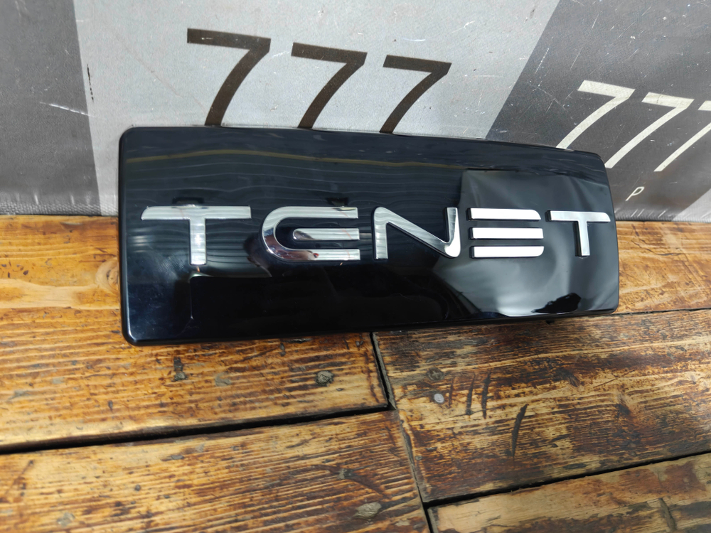 Эмблема передняя Tenet T7 25-нв Б/У Оригинал 602009914AA