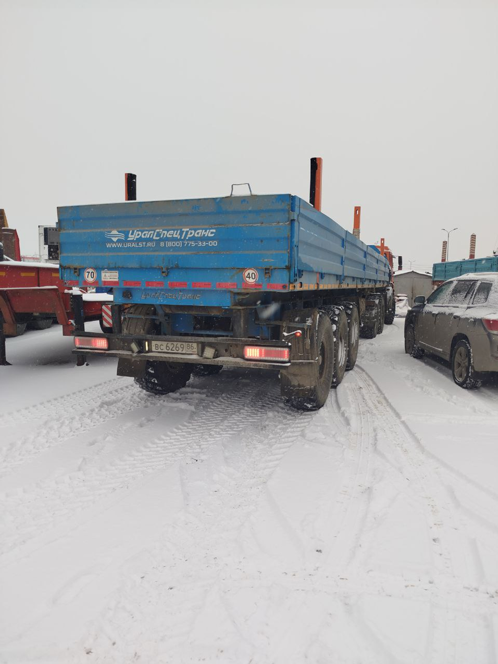 УралСпецТранс 9465* Полуприцеп бортовой 946511-000J311-31