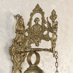 Настенный колокол с фигурой