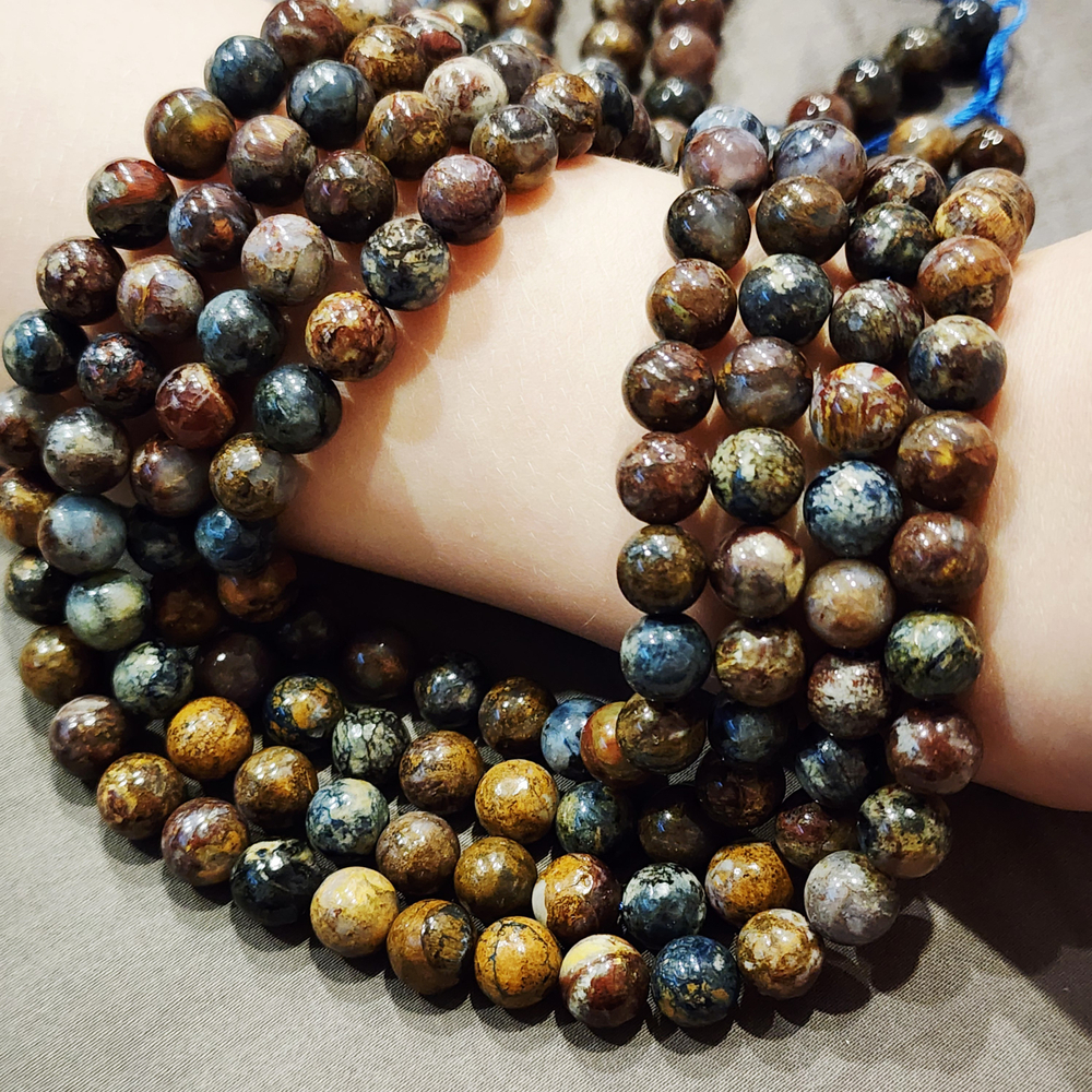 Питерсит, пестрый, гладкий шар 8 - 8.2мм, цена за нить 9.5см (1/4)