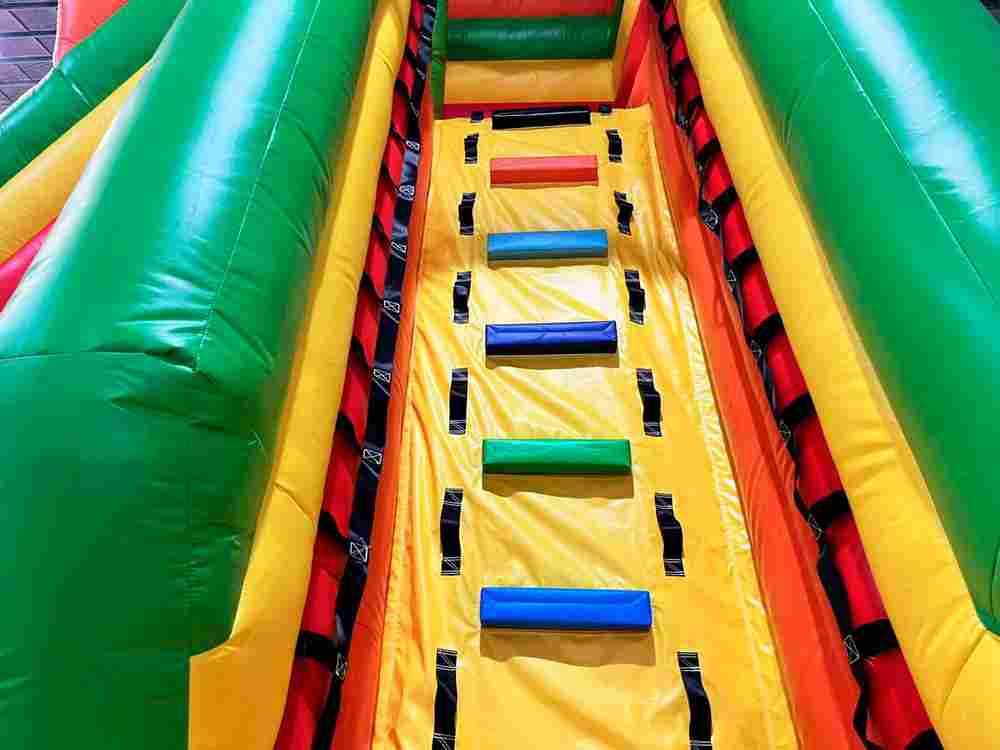 Коммерческий надувной батут "Джунгли" с горкой, 10*6*4.5 м