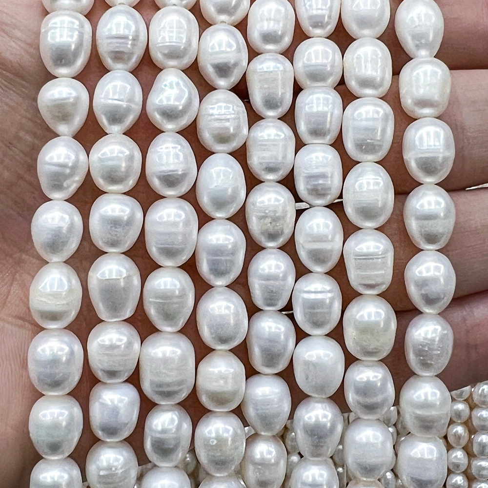 Жемчуг 3А речной бусины Рис 8-10 мм, на нитке 38 см