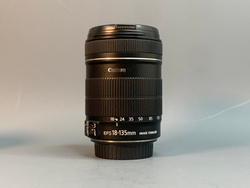 Canon EF-S 18-135 mm f/3.5-5.6 IS Скол внутри линзы