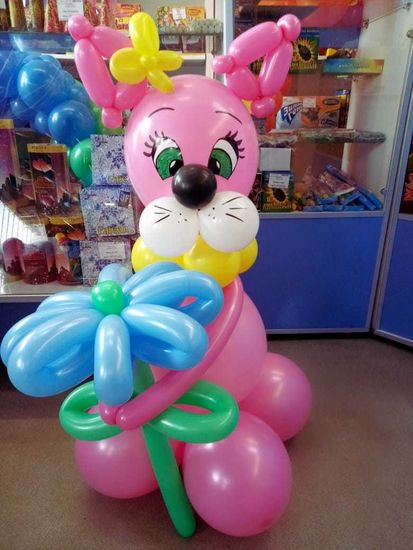 Кошечка с цветком