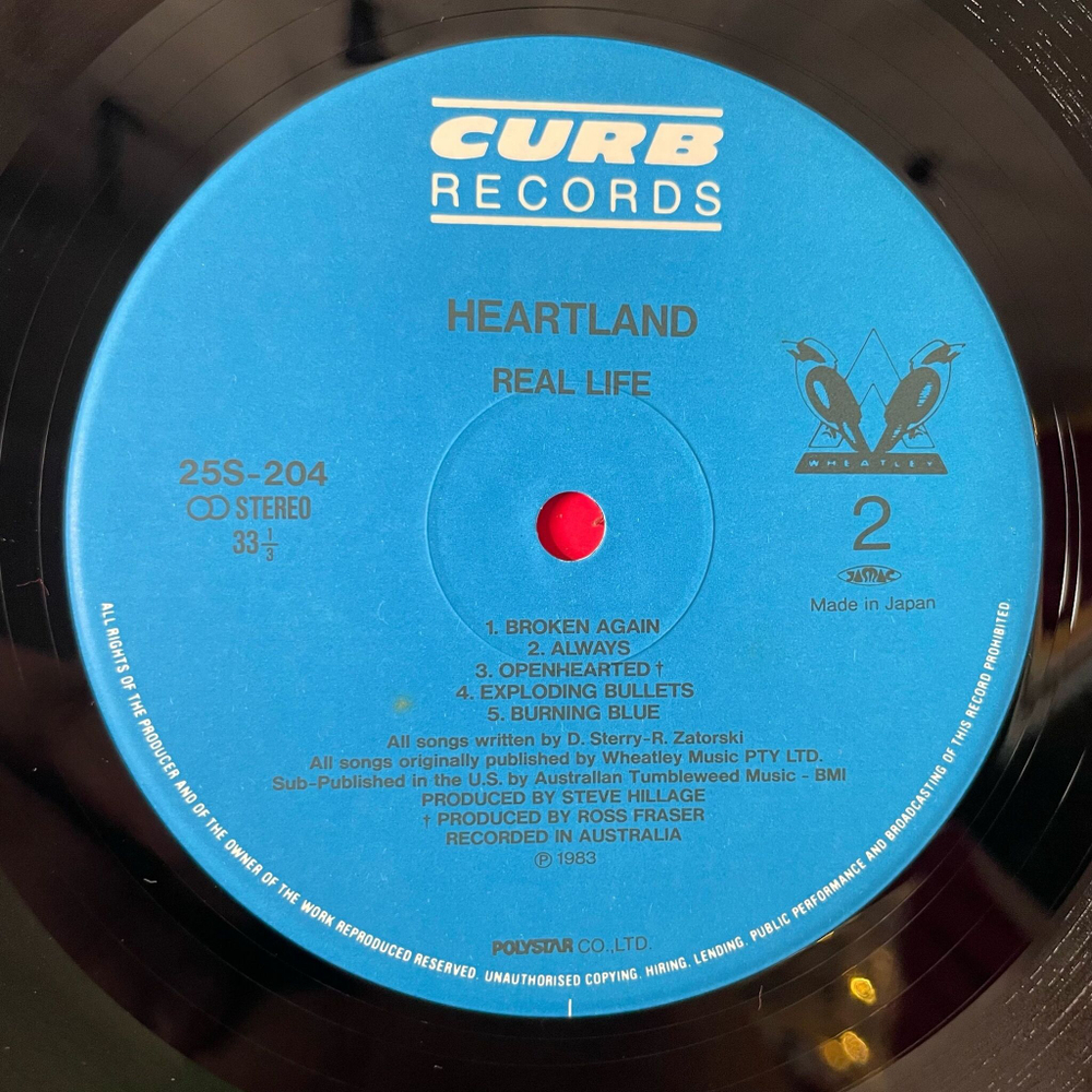 Винтажная виниловая пластинка LP Real Life Heartland (Japan 1984) (Obi)
