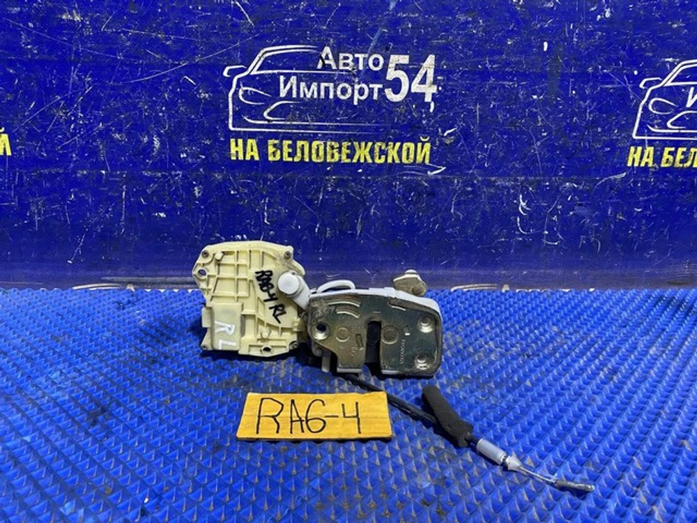 Замок двери задней левой Honda ODYSSEY 2000