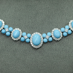 Колье голубые цветы в камнях