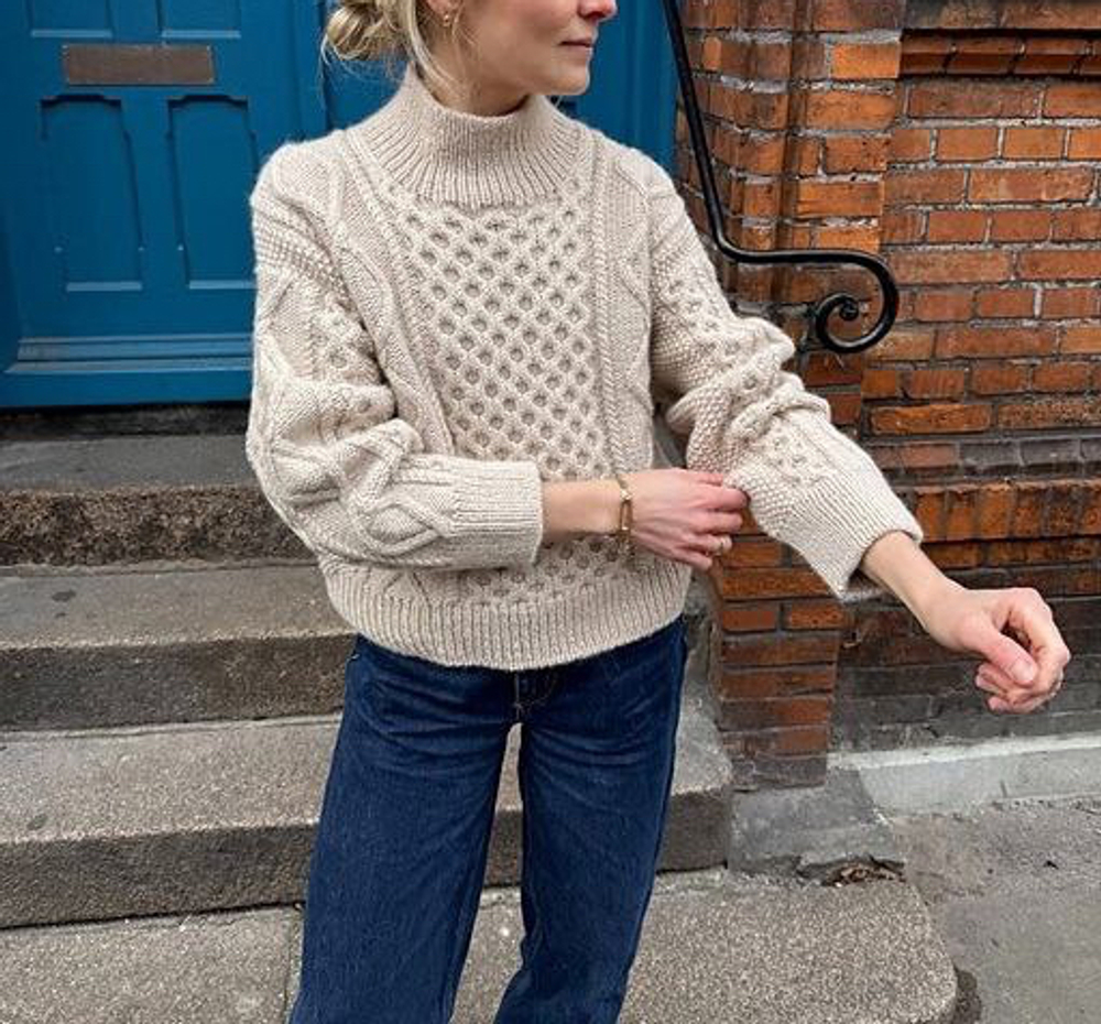 Описание по вязанию свитера спицами "Domar"