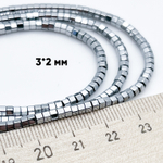 Гематит (имитация), цвет серебристый, размер около 2*3 мм, цена за нить 38 см