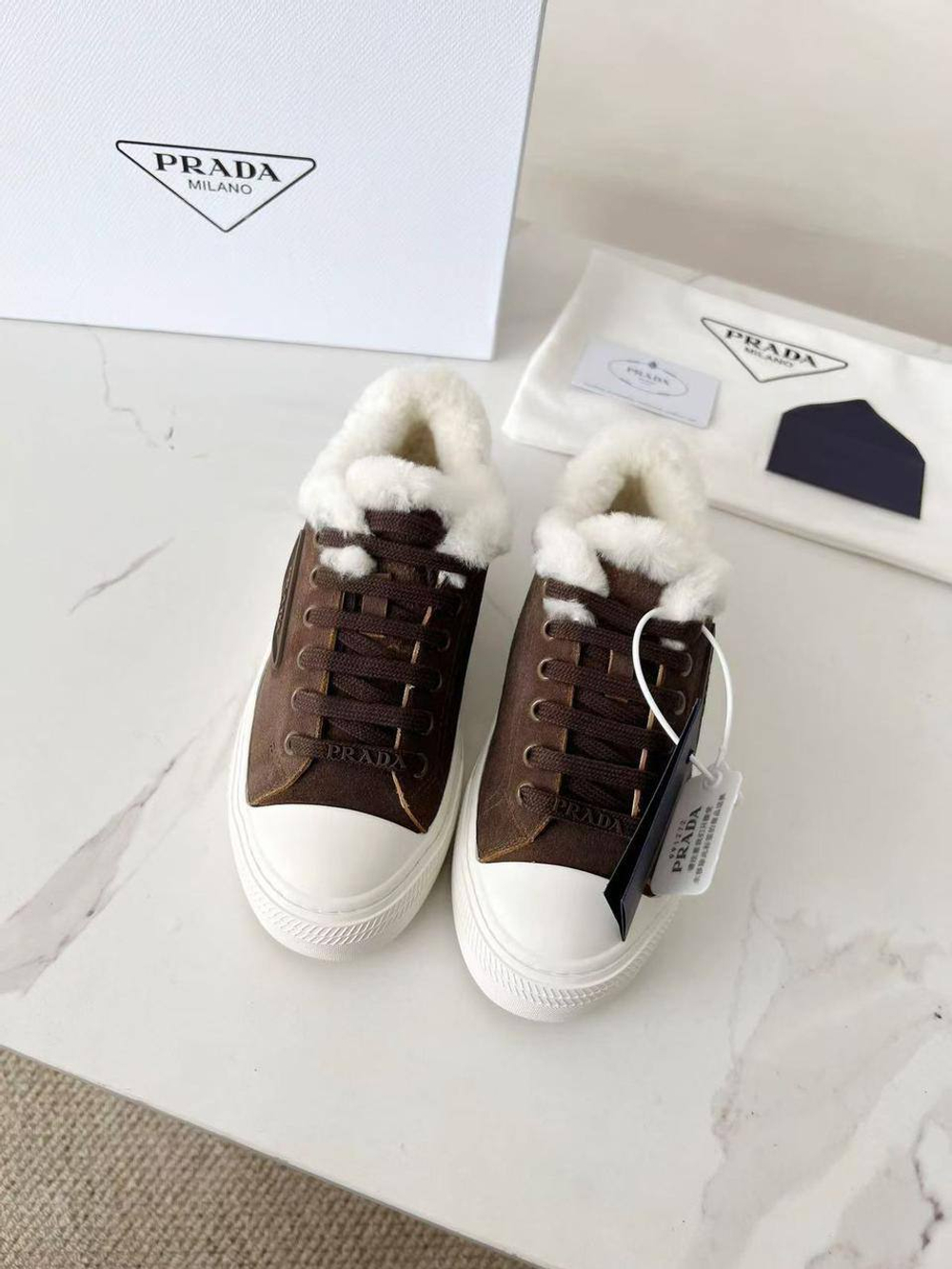 Кроссовки Prada