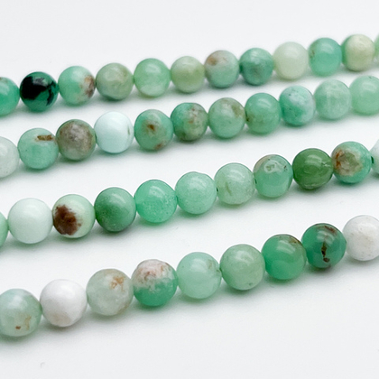 Хризопраз, диаметр 5,6-5,8 мм, цена за отрезок 19 см (1/2 нити)