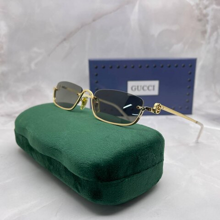 Солнцезащитные очки Gucci