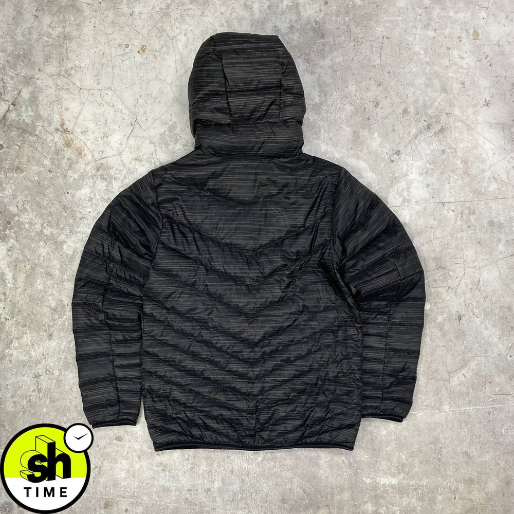 Микропуховик Nike