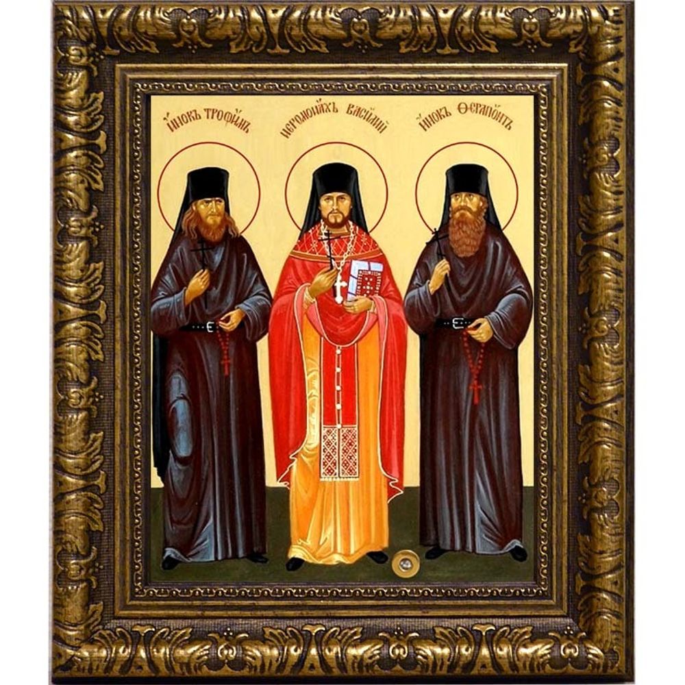 Икона Оптинских Новомучеников на холсте с мощевиком.
