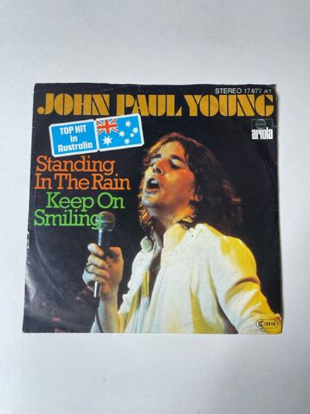 Винтажная виниловая пластинка LP John Paul Young Standing In The Rain / Keep On Smiling (Germany 1977) 7 дюймов