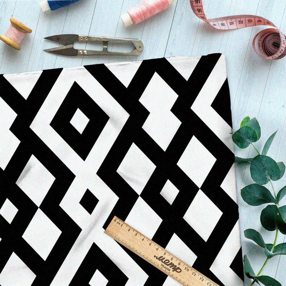 Ткань интерлок ромбовидный узор на белом фоне