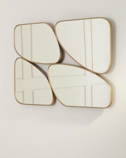 Золотое настенное зеркало “Муан”