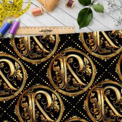 Ткань Барби золотая монограмма на черном