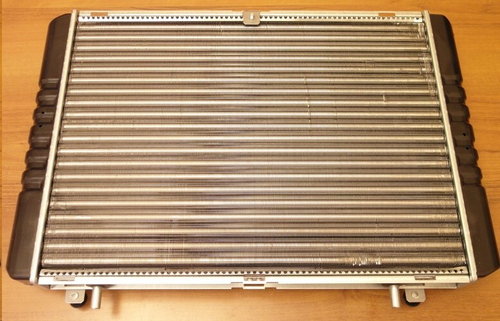 Радиатор основ. алюм. /Г-3302/ с 1999 г.в. 3-х ряд. (на штырях) под датчик (AKL)