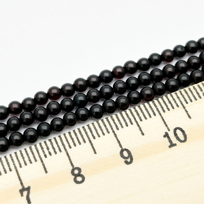 Янтарь бусины, цвет черный, размер 3 мм, цена за отрезок 8,5 см (1/4 нити)